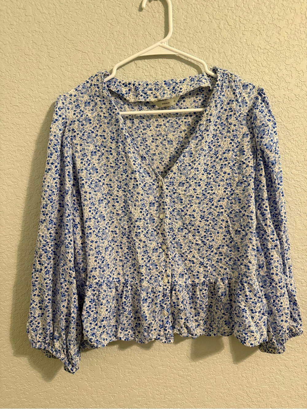 Pigalle Women's Blue Floral V-Neck Peplum Blouse